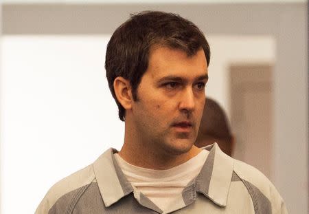 Former South Carolina police officer Michael Slager walks to the defense table during his bond hearing in Charleston, South Carolina September 10, 2015. REUTERS/Randall Hill