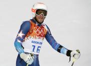 United States' Bode Miller arrives in the finish area after the first run of the men's giant slalom at the Sochi 2014 Winter Olympics, Wednesday, Feb. 19, 2014, in Krasnaya Polyana, Russia. (AP Photo/Christophe Ena)