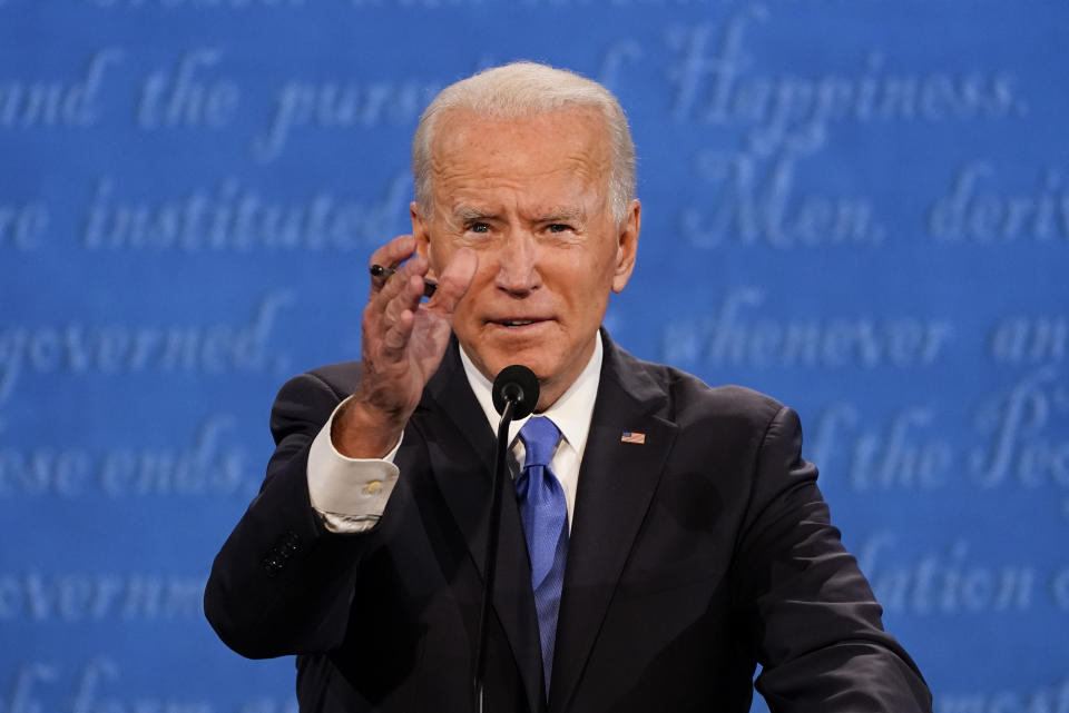 Democratic presidential candidate former Vice President Joe Biden gestures while speaking during the second and final presidential debate Thursday, Oct. 22, 2020, at Belmont University in Nashville, Tenn. (AP Photo/Julio Cortez)