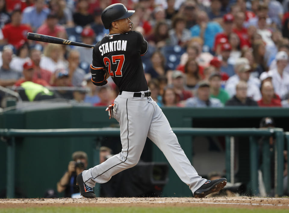 Giancarlo Stanton thinks the Marlins could compete, but ownership wants to slash payroll instead. (AP Photo)