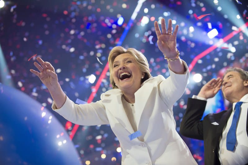 Hillary Clinton reaches out for balloons after her acceptance speech during the Democratic National Convention at Wells Fargo Center in Philadelphia on July 28, 2016. File Photo by Pete Marovich/UPI