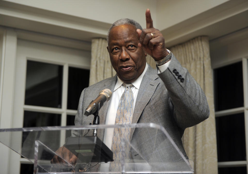 Baseball Hall of Famer Hank Aaron speaks at a reception in his honor, Friday, Feb. 7, 2014, in Washington. Aaron is turning 80 and is being celebrated with a series of events in Washington. (AP Photo/Nick Wass)