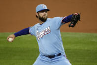 Texas Rangers starting pitcher Jordan Lyles works against the Houston Astros during the first inning of a baseball game in Arlington, Texas, Sunday, Sept. 27, 2020. (AP Photo/Roger Steinman)