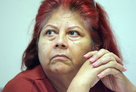 Dora Proa talks about the women she sees on a daily basis at the Access Esperanza clinic, in McAllen, Texas, September 22, 2015. REUTERS/Delcia Lopez