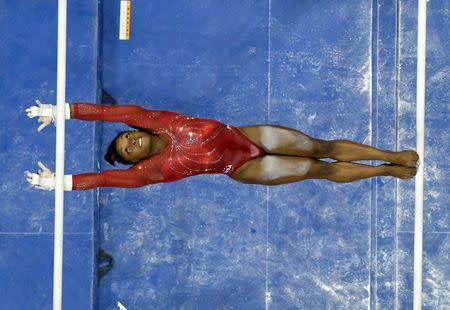 Jul 10, 2016; San Jose, CA, USA; Simone Biles from Spring, TX, during the uneven bars in the women's gymnastics U.S. Olympic team trials at SAP Center. Mandatory Credit: Robert Hanashiro-USA TODAY Sports