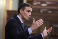 Spain's Prime Minister Pedro Sanchez delivers a speech in a parliamentary session in Madrid, Spain, Wednesday Oct. 21, 2020. Spanish Prime Minister Pedro Sanchez faces a no confidence vote in Parliament put forth by the far right opposition party VOX. (AP Photo/Manu Fernandez, Pool)