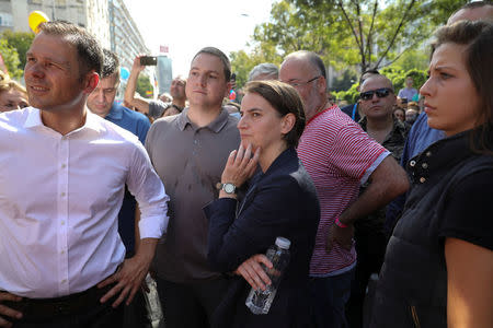 Serbian Prime Minister Ana Brnabic (C) attends an annual LGBT (Lesbian, Gay, Bisexual and Transgender) pride parade in Belgrade, Serbia September 17, 2017. REUTERS/Marko Djurica