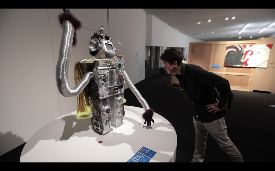 A metallic robot with long arms from Arashi singer Satoshi Ohno's art exhibition Satoshi 2020.  