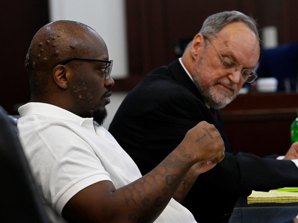 Horace Palmer Williamson III talks with his defense attorney Michael Freeman during his trial at the Justice A.A. Birch Building Wednesday, June 21, 2023, in Nashville, Tenn.