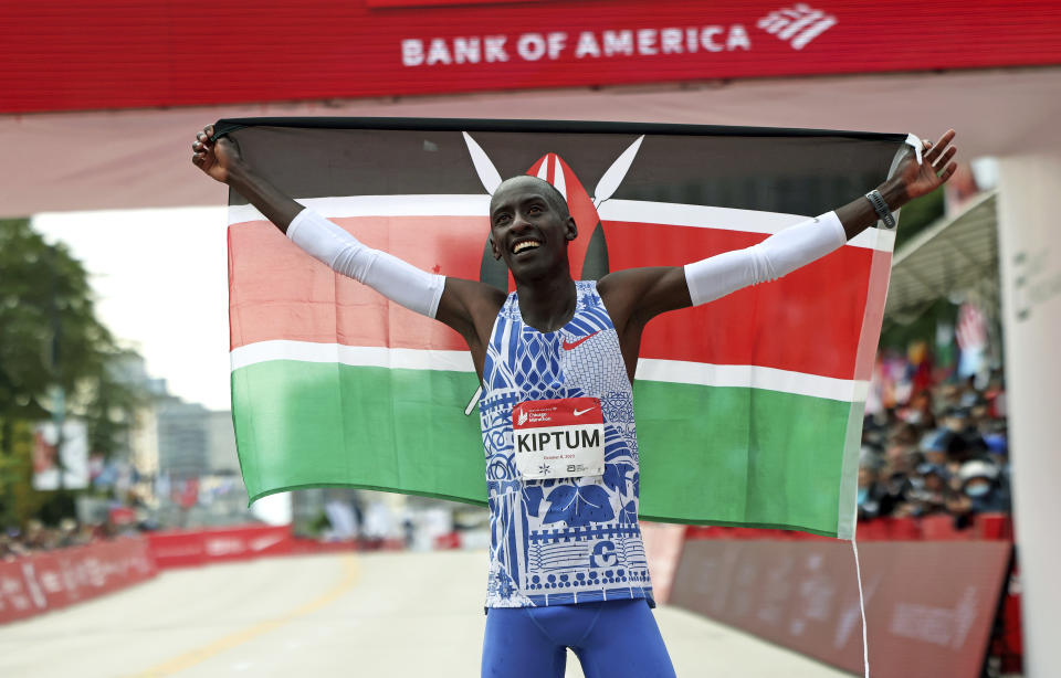 FILE - Kelvin Kiptum of Kenya celebrates his Chicago Marathon world record victory in Chicago's Grant Park on Sunday, Oct. 8, 2023. According to a fellow athlete, Kiptum died in a car crash in Kenya late Sunday, Feb. 11, 2024. He was 24. (Eileen T. Meslar/Chicago Tribune via AP)