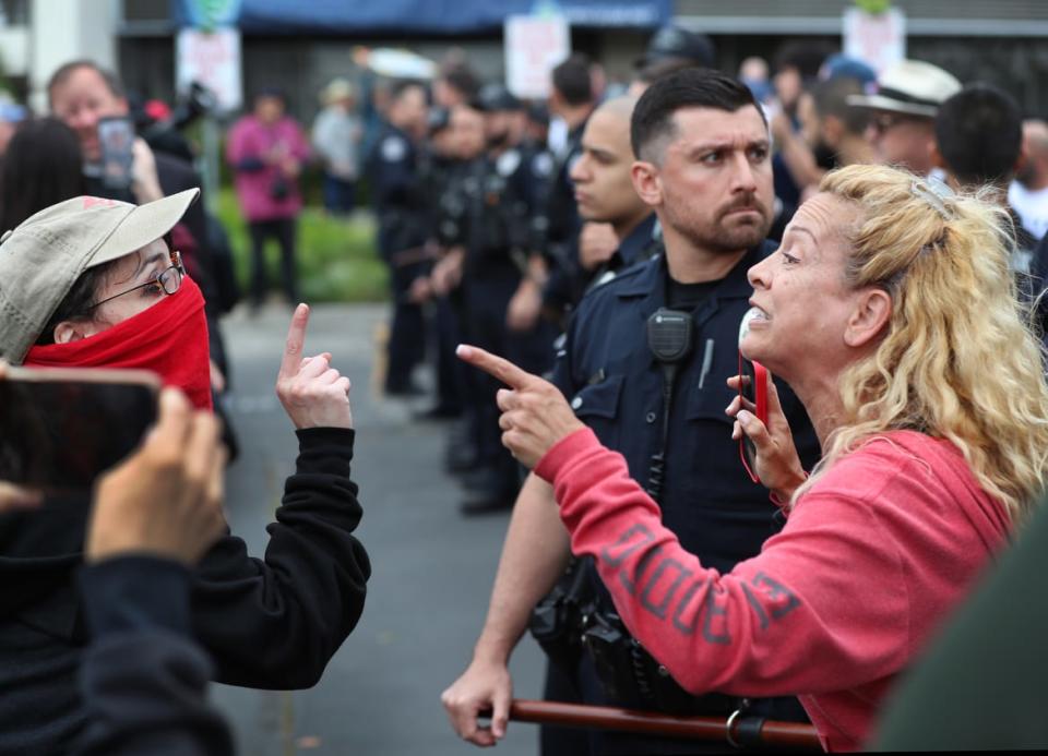 <div class="inline-image__caption"><p>Protestors face off outside Glendale Unified School District meeting in Burbank.</p></div> <div class="inline-image__credit"> Allen J. Schaben/Los Angeles Times via Getty Images</div>