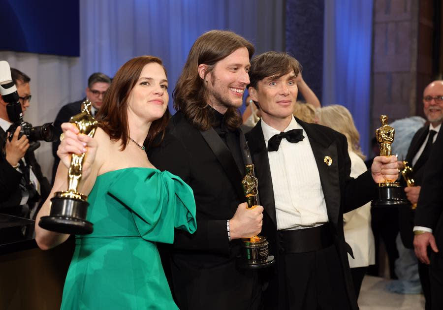 “Oppenheimer” trophy winners were everywhere at the Governors Ball after the 96th Annual Academy Awards, including (Left to Right) Jennifer Lame, Ludwig Göransson and Cillian Murphy, winners of Best Film Editing, Best Score and Best Actor. (Mike Coppola/Getty Images)