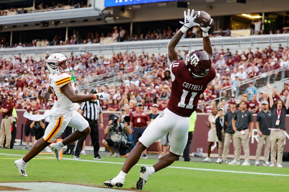 COLLEGE STATION, TEXAS - SEPTEMBER 16: Raymond Cottrell #11 of the Texas A&M Aggies makes a reception for a touchdown against the Louisiana Monroe Warhawks during the second half at Kyle Field on September 16, 2023 in College Station, Texas. (Photo by Carmen Mandato/Getty Images)
