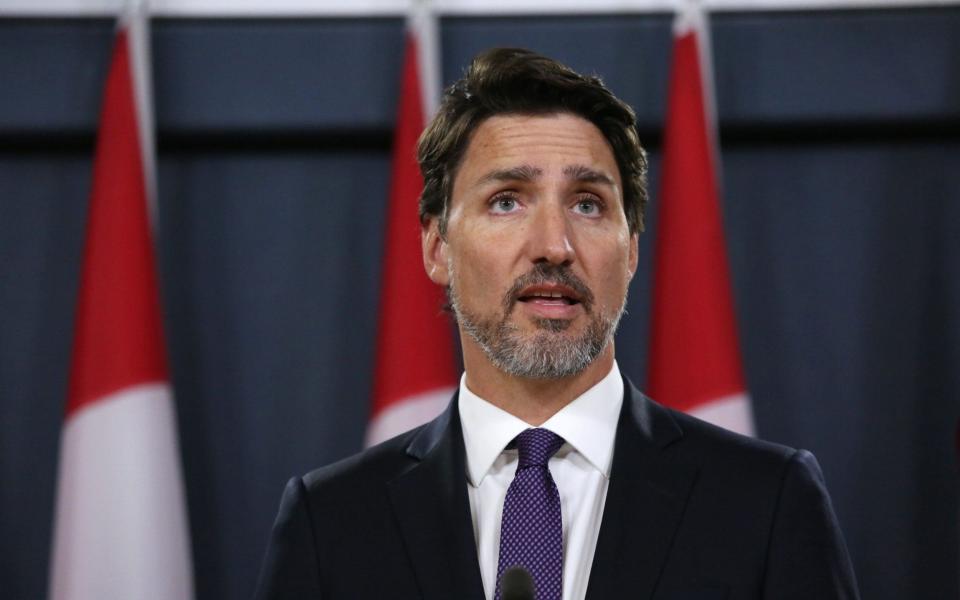 Justin Trudeau said the rollover would be the basis for a new UK-Canada free trade agreement - AFP