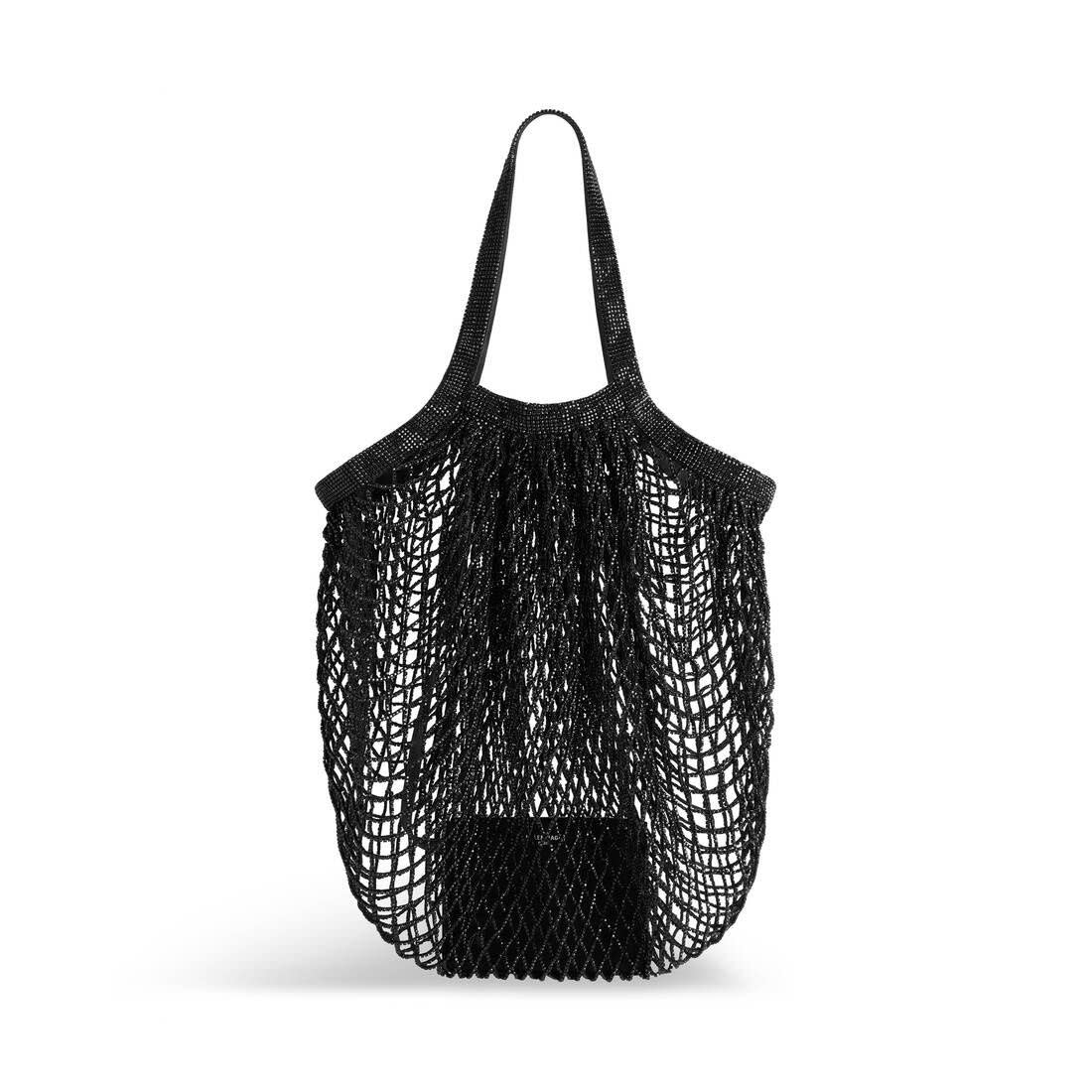 <p><a href="https://www.reversible.com/shopping/women/item/balenciaga-womens-24-7-large-bag-with-rhinestones-in-black-814574993?gad_source=1&gclid=CjwKCAjw8diwBhAbEiwA7i_sJa2uY7nai9SvOeOkxOKt5LTAiT7vULVA2cf0R0hHnBTCYLV1nrnaRhoC364QAvD_BwE" rel="nofollow noopener" target="_blank" data-ylk="slk:Shop Now;elm:context_link;itc:0;sec:content-canvas" class="link rapid-noclick-resp">Shop Now</a></p><p>Women’s 24/7 Large Bag With Rhinestones in Black</p><p>reversible.com</p><p>$10990.00</p>