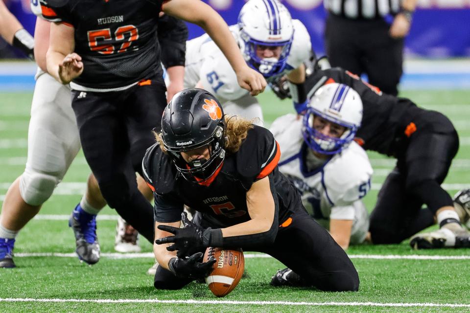 Hudson defensive end Easten Strodtman recovers a Beal City fumble during the second half of Hudson's 14-7 win in the Division 8 state final on Friday, Nov. 26, 2021, at Ford Field.