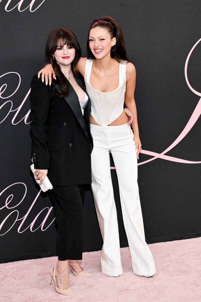 Selena Gomez and Nicola Peltz at the premiere of "Lola" held at the Regency Bruin Theatre on February 3, 2024 in Los Angeles, California.