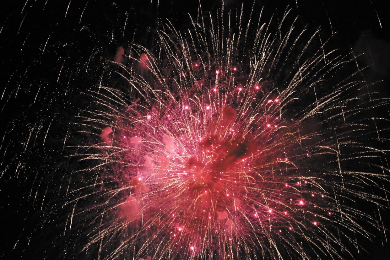 A fireworks display rises above the Maury County Park on July 4, 2016. 