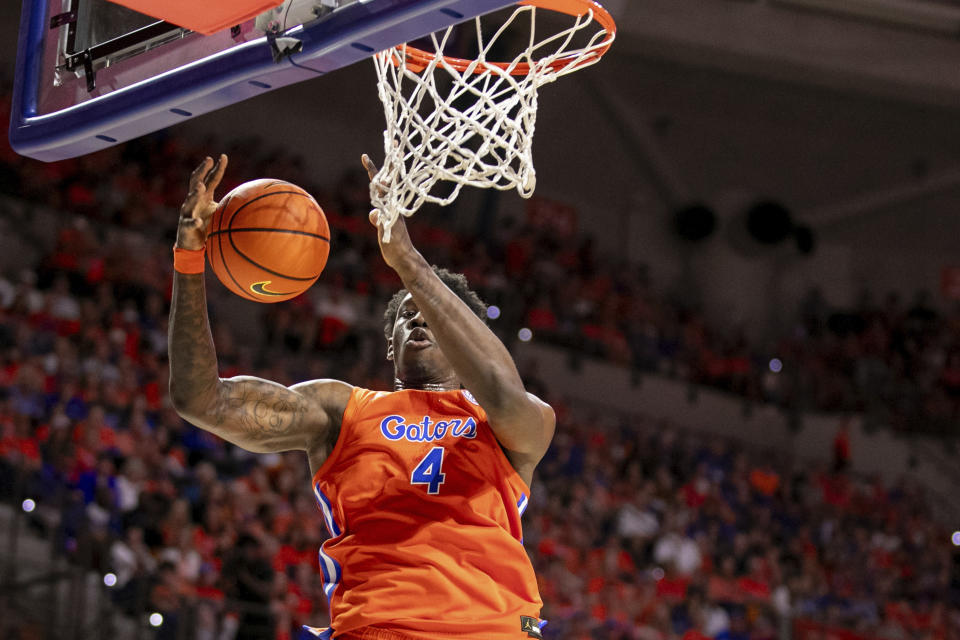 Florida forward Tyrese Samuel (4) dunks during the first half of an NCAA college basketball game against Kentucky Saturday, Jan. 6, 2024, in Gainesville, Fla. (AP Photo/Alan Youngblood)