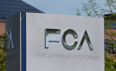 FILE PHOTO: A Fiat Chrysler Automobiles (FCA) sign is seen at its U.S. headquarters in Auburn Hills, Michigan