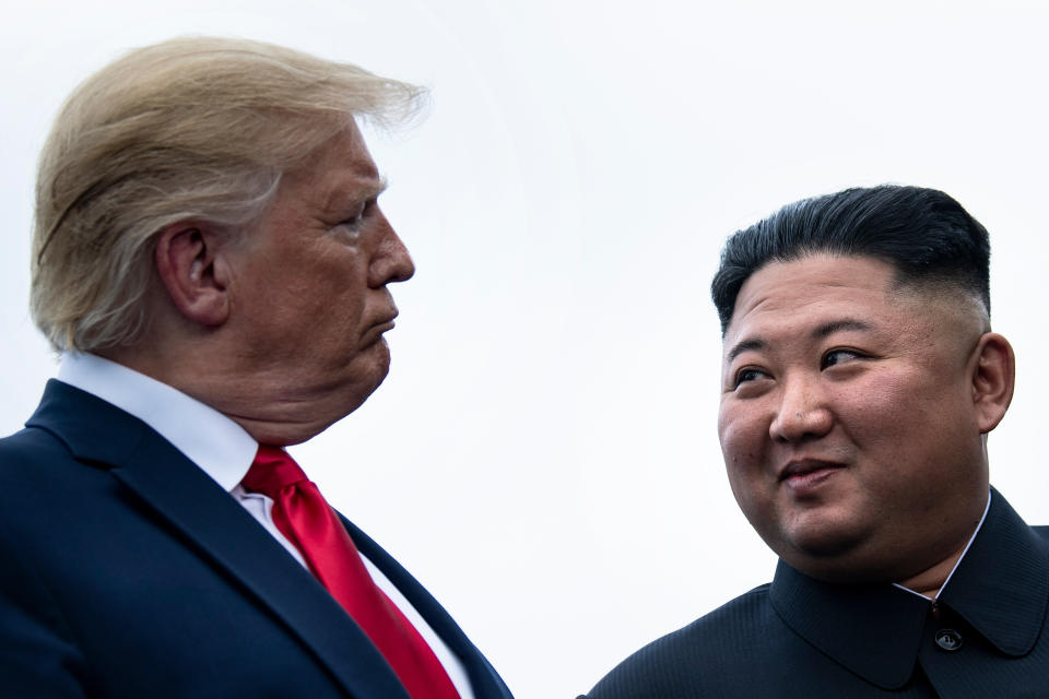 President Donald Trump and North Korea's leader, Kim Jong Un, talk before a meeting in the Demilitarized Zone on June 30, 2019, in Panmunjom. (Photo: BRENDAN SMIALOWSKI/AFP via Getty Images)