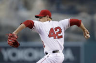 Los Angeles Angels starting pitcher Garrett Richards winds up during the first inning of a baseball game against the Oakland Athletics on Tuesday, April 15, 2014, in Anaheim, Calif. (AP Photo/Jae C. Hong)