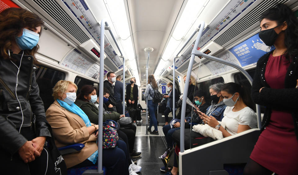 Passengers ride in an Underground train during the rush hour in London. The Prime Minister said people were returning in "huge numbers to the office" but Downing Street said it could not yet provide information to back up the claim. (Photo by Victoria Jones/PA Images via Getty Images)