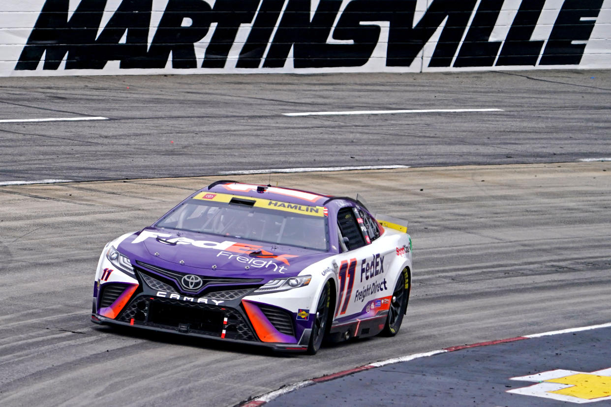 Oct 30, 2022; Martinsville, Virginia, USA; NASCAR Cup Series driver Denny Hamlin (11) during the Xfinity 500 at Martinsville Speedway. Mandatory Credit: Peter Casey-USA TODAY Sports