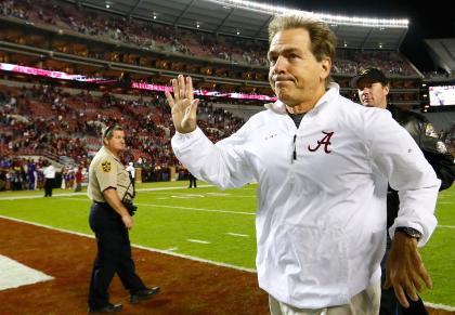 TUSCALOOSA, AL - NOVEMBER 22: Head coach Nick Saban of the Alabama Crimson Tide runs off the field after their 48-14 win over the Western Carolina Catamounts at Bryant-Denny Stadium on November 22, 2014 in Tuscaloosa, Alabama. (Photo by Kevin C. Cox/Getty Images)