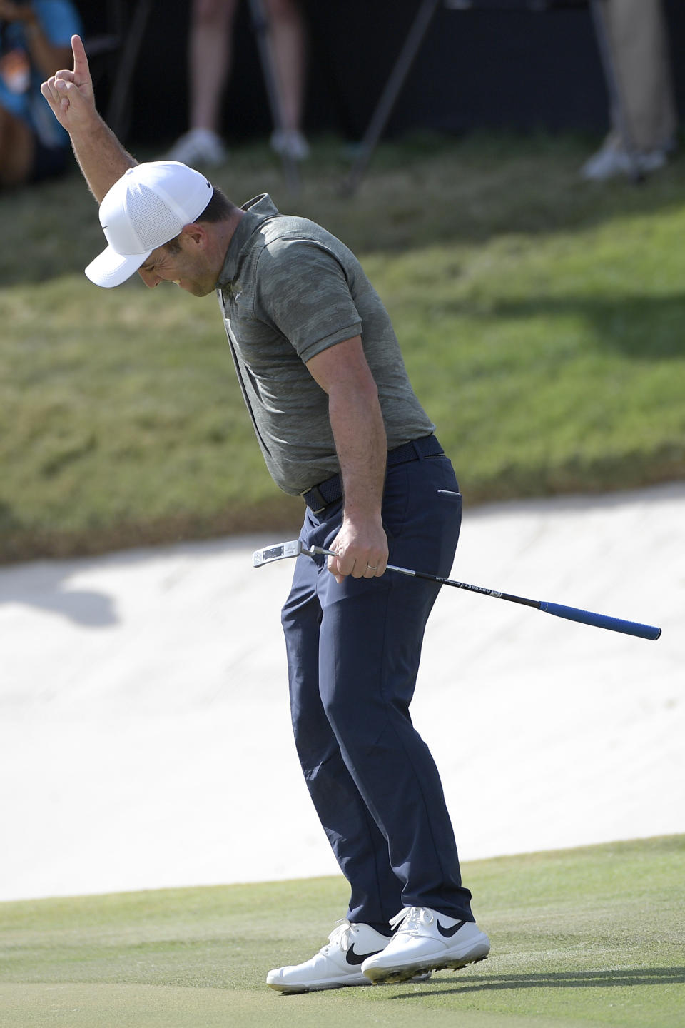 Francesco Molinari, of Italy, celebrates after sinking a putt for birdie on the 18th green during the final round of the Arnold Palmer Invitational golf tournament Sunday, March 10, 2019, in Orlando, Fla. Molinari won the tournament. (AP Photo/Phelan M. Ebenhack)