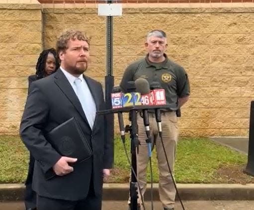 U.S. Attorney Peter Leary, left, and Oconee County Sheriff James Hale announced an arrest in the Racetrac slaying in March 2022.
