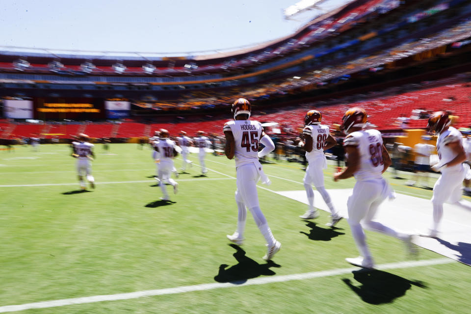 Washington Commanders take the field for an NFL preseason football game against the Carolina Panthers on Saturday, Aug. 13, 2022, in Landover, Md. (Shaban Athuman/Richmond Times-Dispatch via AP)