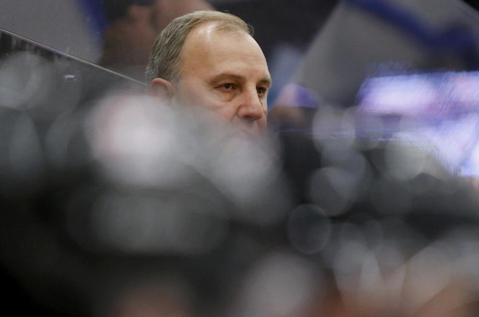 Canada's head coach Brent Sutter watches the game against the United States from the bench during the second period of their IIHF World Junior Championship ice hockey game in Malmo, Sweden, December 31, 2013. REUTERS/Alexander Demianchuk (SWEDEN - Tags: SPORT ICE HOCKEY)