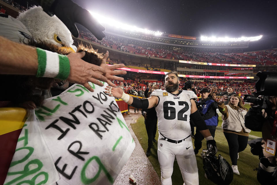 Philadelphia Eagles center Jason Kelce shakes hands with fans following an NFL football game against the Kansas City Chiefs on Monday, Nov. 20, 2023, in Kansas City, Mo. The Eagles won 21-17. (AP Photo/Charlie Riedel)