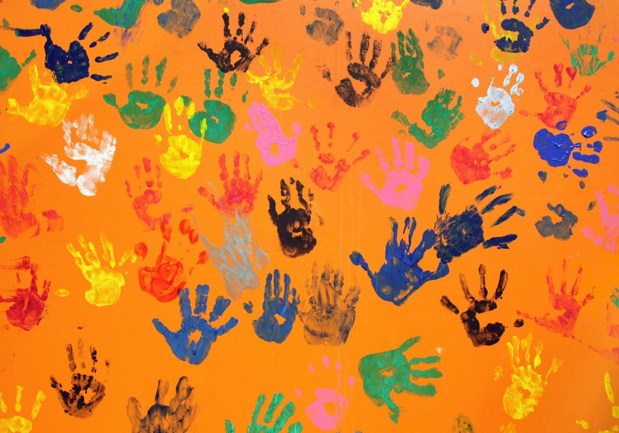 <span class="caption">Even identical twins have different fingerprints.</span> <span class="attribution"><a class="link " href="https://www.shutterstock.com/image-photo/multiple-colored-hand-prints-on-orange-93461938" rel="nofollow noopener" target="_blank" data-ylk="slk:El Greco/Shutterstock.com;elm:context_link;itc:0;sec:content-canvas">El Greco/Shutterstock.com</a></span>