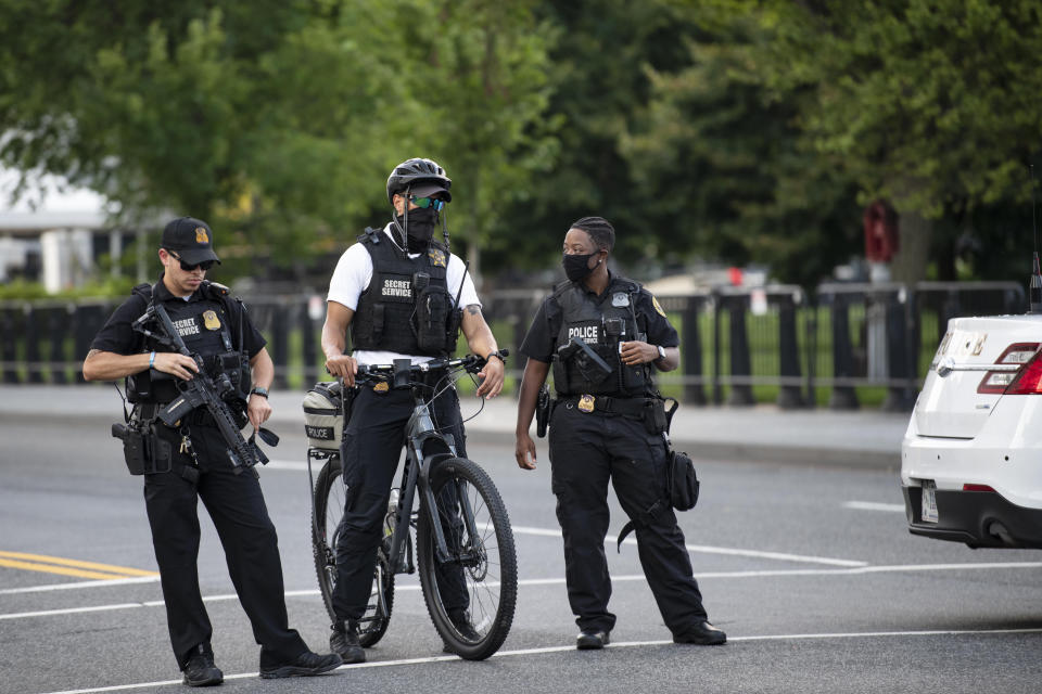 WASHINGTON, D.C., Aug. 10, 2020 -- U.S. Secret Service staff respond to a shooting near the White House in Washington, D.C., the United States, Aug. 10, 2020. U.S. President Donald Trump on Monday afternoon was temporarily escorted by the Secret Service away from an ongoing coronavirus briefing after a shooting was reported outside the White House.(Photo by Liu Jie/Xinhua via Getty) (Xinhua/Liu Jie via Getty Images)