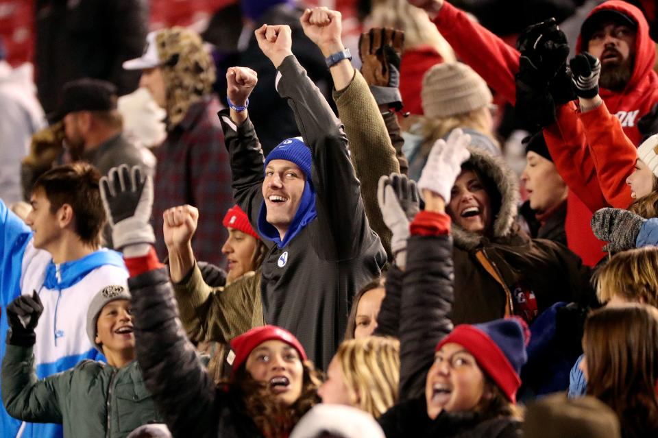 Crimson Cliffs fans cheer during a 4A semifinal football game against Ridgeline at Rice-Eccles Stadium in Salt Lake City on Friday, Nov. 10, 2023. Crimson Cliffs won 31-24. | Kristin Murphy, Deseret News