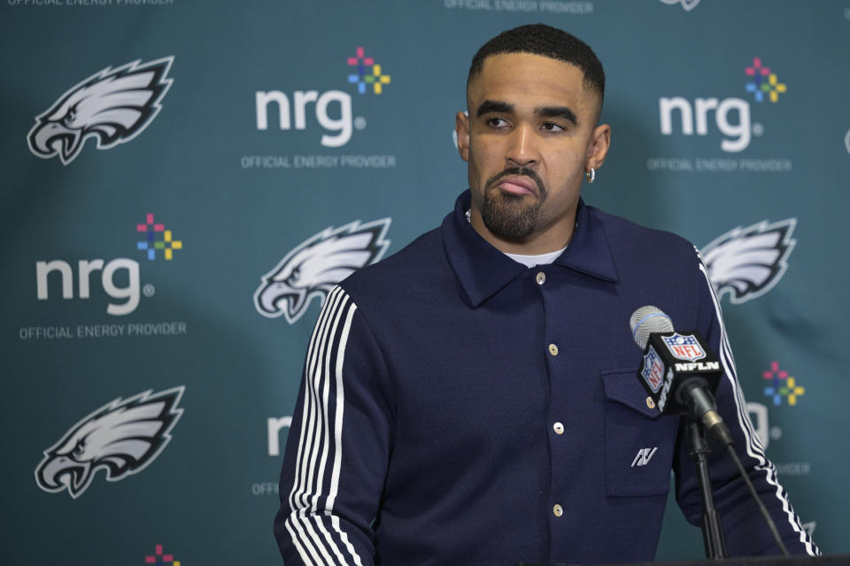 Philadelphia Eagles quarterback Jalen Hurts talks to reporters following an NFL wild-card playoff football game against the Tampa Bay Buccaneers, Tuesday, Jan. 16, 2024, in Tampa, Fla. The Buccaneers won 32-9. (AP Photo/Phelan M. Ebenhack)