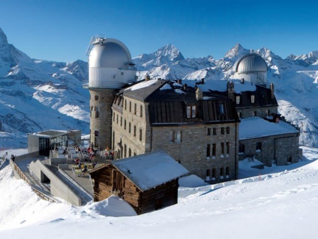 <b>WHERE</b> <a href="http://www.gornergrat-kulm.ch/en/kulmhotel-gornergrat/hotel/" rel="nofollow noopener" target="_blank" data-ylk="slk:3100 Kulmhotel Gornergrat;elm:context_link;itc:0;sec:content-canvas" class="link ">3100 Kulmhotel Gornergrat</a>: The highest hotel in the Swiss Alps, near the municipality of Zermatt. <br><br><b>ALTITUDE</b> 10,170 feet <br><br><b>THE ASCENT</b> Zermatt is accessed by train, and then the Gornergrat Bahn, a mountain railway, take you the rest of the way. <br><br><b>PRICE</b> Room rates vary depending on season and view—the Matterhorn is going to cost you—but a double room can be had for around $300 USD.