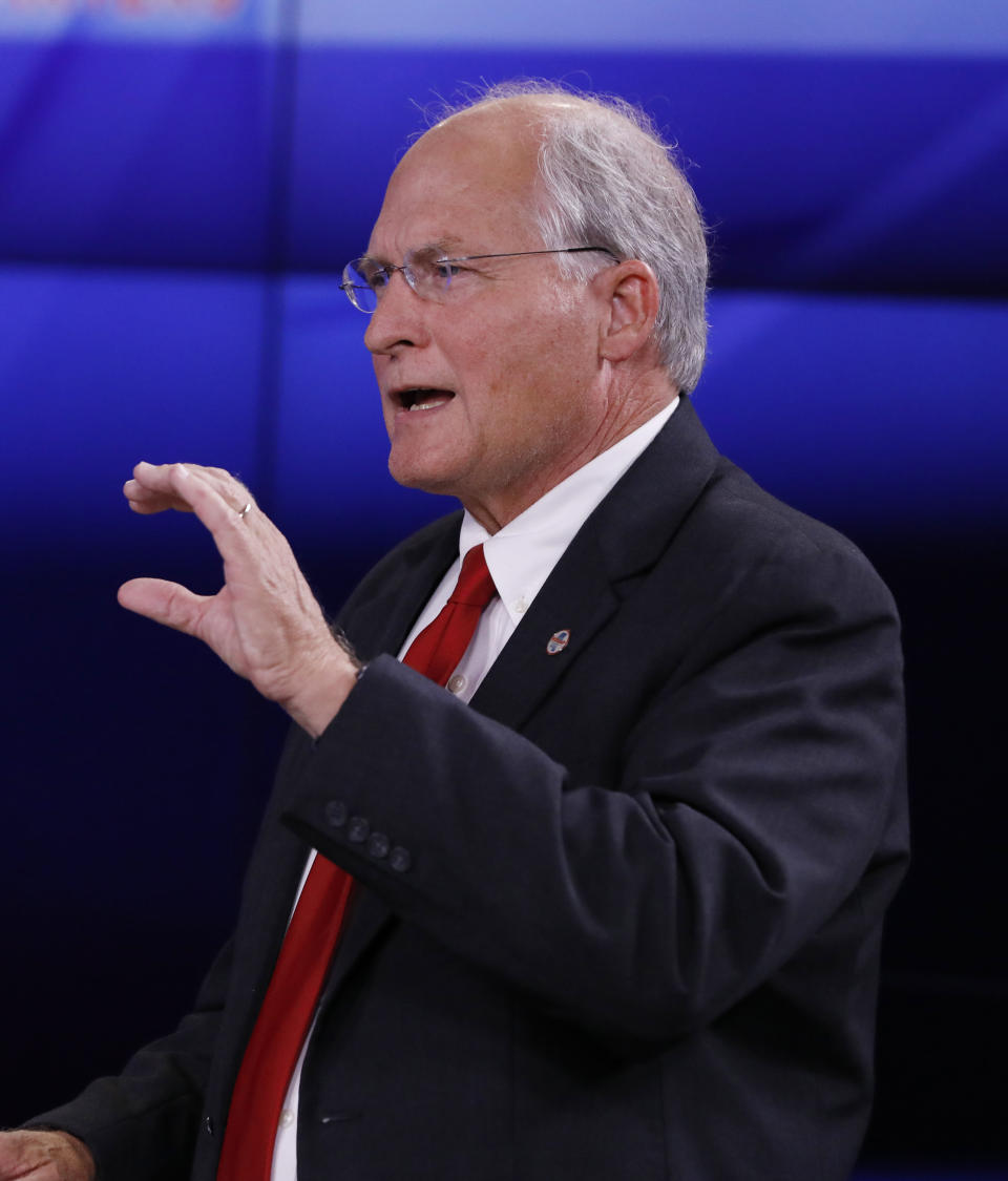 Former Mississippi Supreme Court Chief Justice and Republican gubernatorial candidate Bill Waller Jr., answers a question during a GOP gubernatorial runoff debate against Lt. Gov. Tate Reeves, unseen, in Jackson, Miss., Wednesday, Aug. 21, 2019. (AP Photo/Rogelio V. Solis)