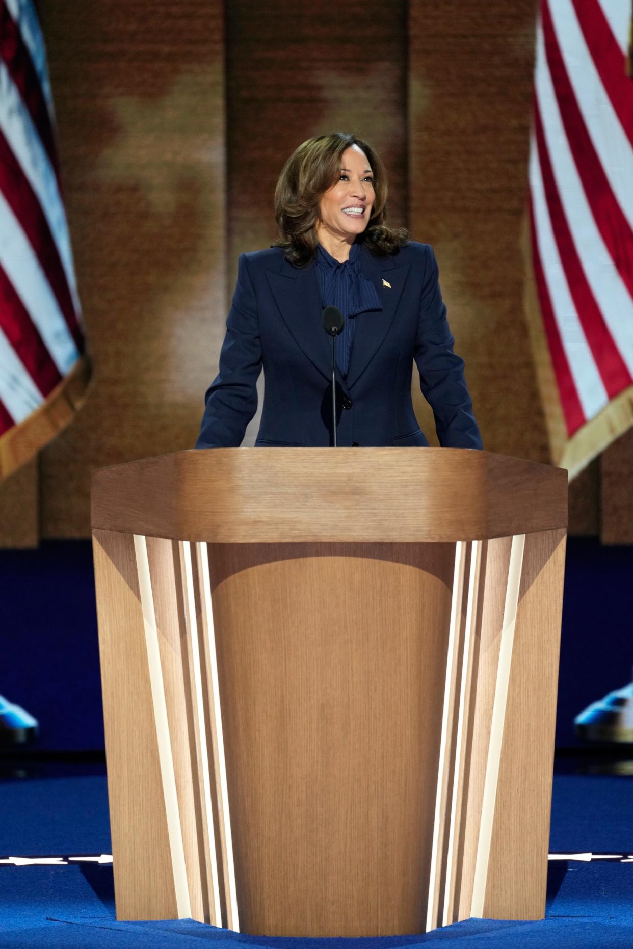 Democratic Presidential nominee Vice President Kamala Harris delivers her acceptance speech during the final day of the Democratic National Convention at the United Center.