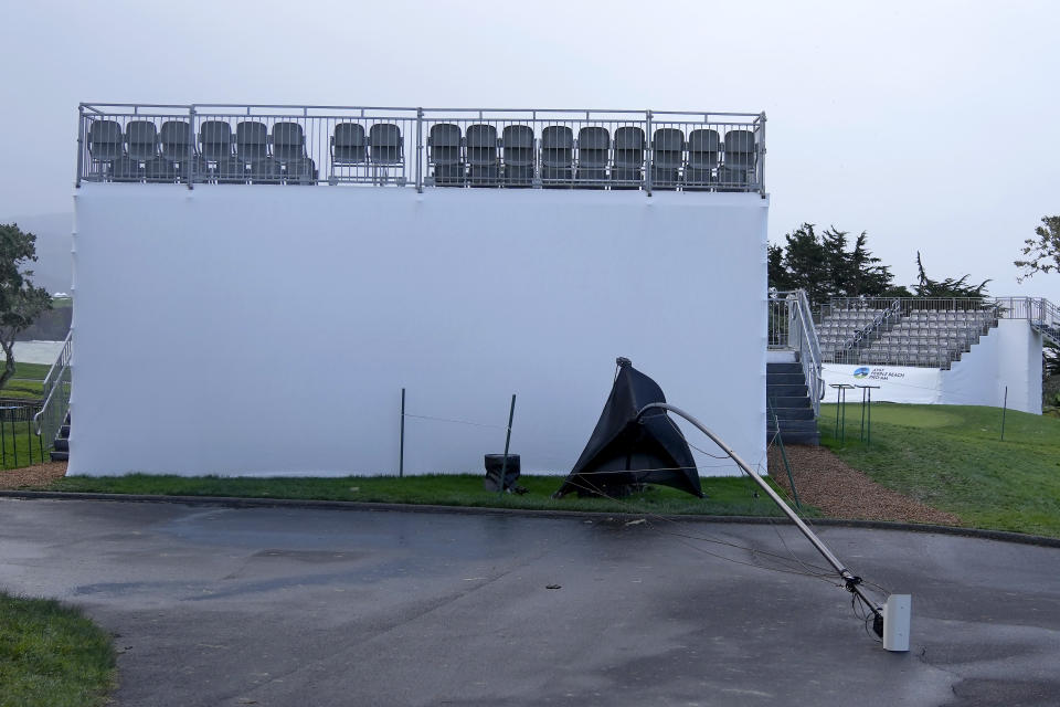 A fallen security camera is shown near a seating area at Pebble Beach Golf Links before the scheduled final round of the AT&T Pebble Beach National Pro-Am golf tournament in Pebble Beach, Calif., Sunday, Feb. 4, 2024. (AP Photo/Ryan Sun)