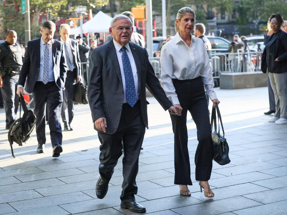 Nadine and Bob Menendez arrive at court during after an indictment on corruption charges.