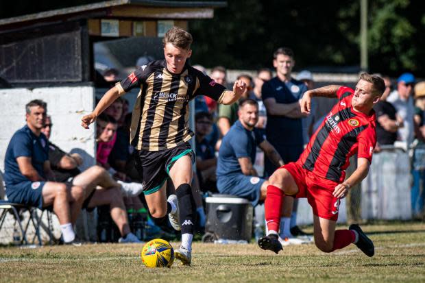 Marcus Daws (Poole, left) in action during the Southern League Premier South game between Winchester City and Poole Town on Sat 6th August 2022 at Charters Community Stadium, Winchester, Hampshire. Photo: Ian Middlebrook.
