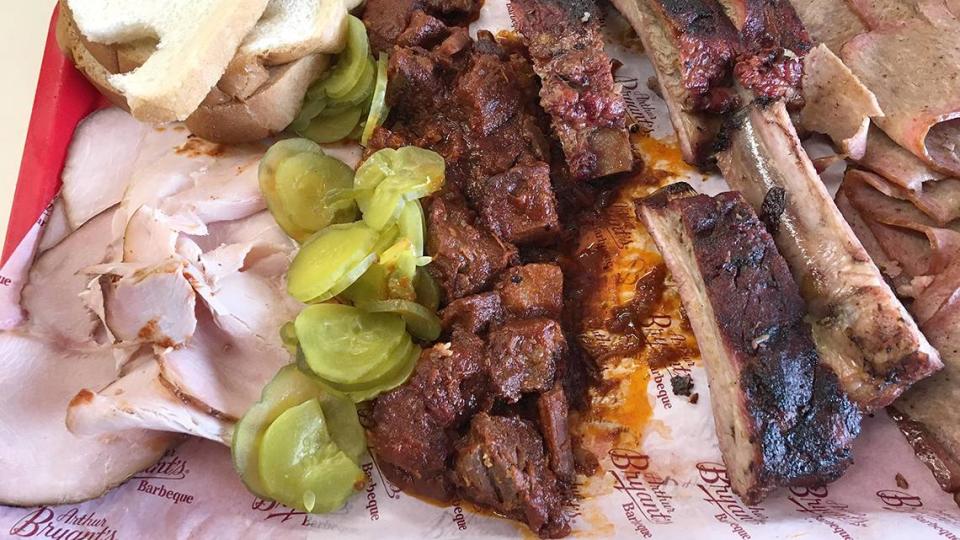 Meat from Arthur Bryant’s Barbecue, 1727 Brooklyn Ave., includes smoked turkey, pickles, burnt ends, ribs and sausage.