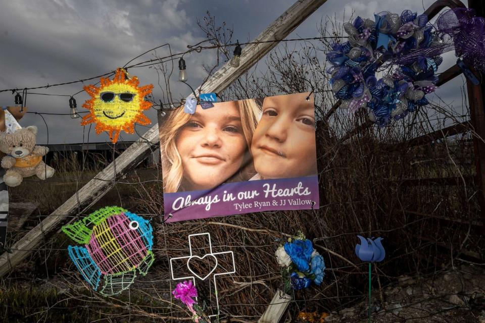 PHOTO: A banner with photos of Tylee Ryan and her brother J.J. Vallow decorates a fence set up as a memorial near where her body was found, May 10, 2023, in Rexburg, Idaho. (Natalie Behring/Getty Images, FILE)