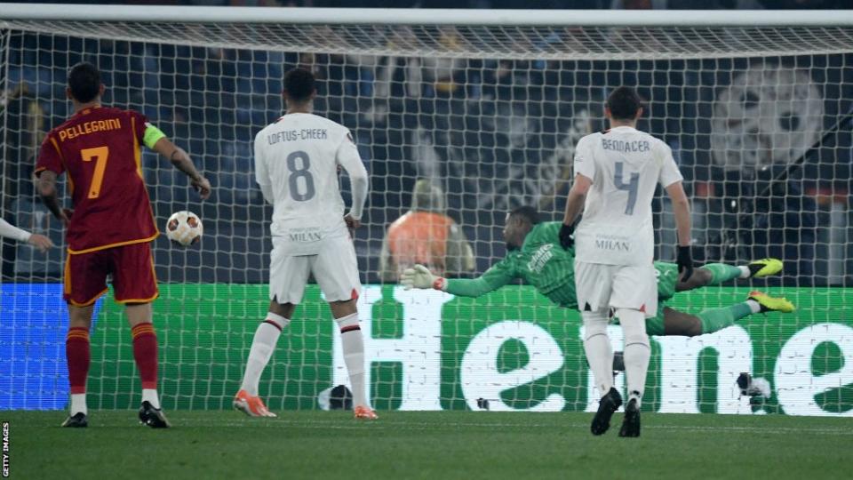 Mike Maignan fails to stop a goal by Roma's Argentine forward Paulo Dybala