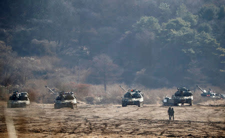 The South Korean army's K-55 self-propelled artillery vehicles take part in a military exercise near the demilitarised zone separating the two Koreas in Paju, South Korea, November 29, 2017. REUTERS/Kim Hong-Ji