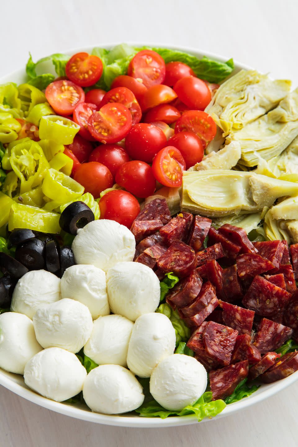 <p>Give us all the toppings. </p><p>Get the recipe from <a href="https://www.delish.com/cooking/recipe-ideas/a19885331/antipasto-salad-recipe/" rel="nofollow noopener" target="_blank" data-ylk="slk:Delish;elm:context_link;itc:0;sec:content-canvas" class="link ">Delish</a>.</p>