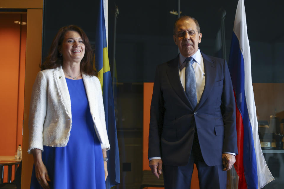 In this photo released by the Russian Foreign Ministry Press Service, Swedish Minister of Foreign Affairs Ann Linde and Russian Foreign Minister Sergey Lavrov pose for a photo prior to their talks on the side of the Arctic Council Ministers Working Dinner in Reykjavik, Iceland, Wednesday, May 19, 2021. (Russian Foreign Ministry Press Service via AP)